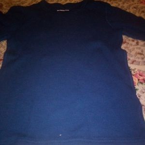 Long sleeved shirt black and the brand is Amazon essentials and the size is l/g